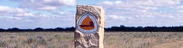 An upright stone marker on the Santa Fe Trail in southeastern Colorado